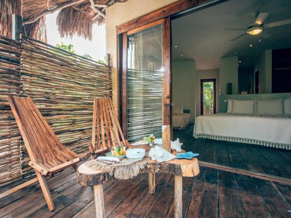 Orchid House Tulum Beach : photo 9 de la chambre suite principale brassalova - vue sur jardin