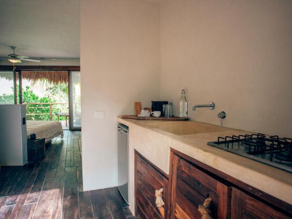 Orchid House Tulum Beach : photo 7 de la chambre suite principale brassalova - vue sur jardin