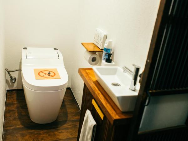 Guest House KuKu : photo 1 de la chambre dortoir réservé aux femmes de style japonais avec futon simple