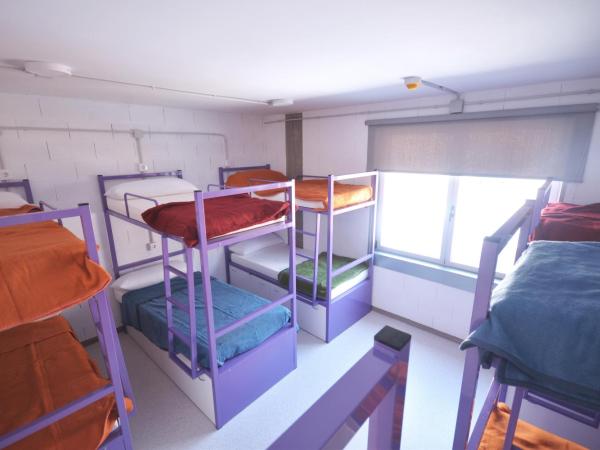 Scout Madrid Hostel : photo 3 de la chambre lit dans un dortoir mixte de 12 lits avec salle de bains commune