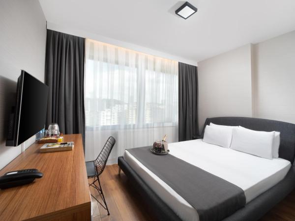 Nish Suites Atasehir : photo 8 de la chambre chambre triple deluxe