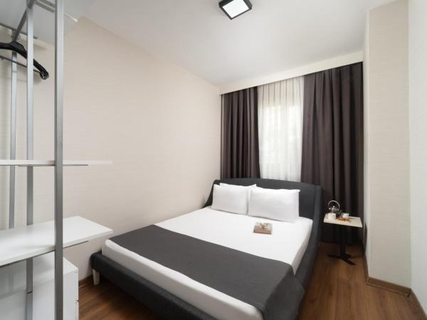 Nish Suites Atasehir : photo 10 de la chambre chambre triple deluxe