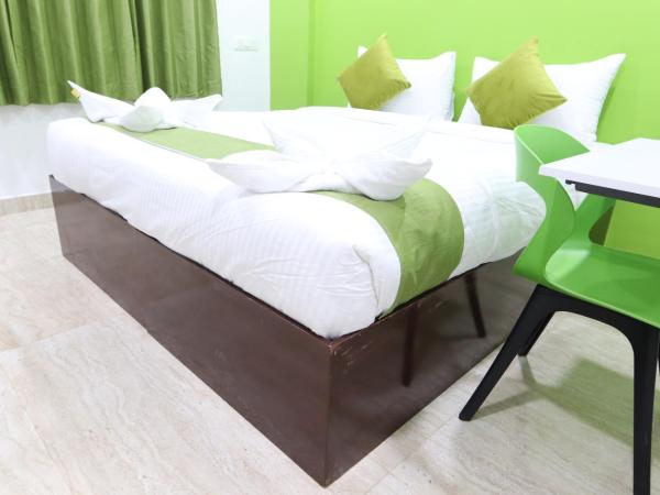 Athulya Stays : photo 10 de la chambre chambre lit king-size supérieure