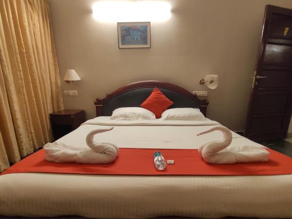 karthika residency : photo 6 de la chambre chambre double deluxe (2 adultes + 1 enfant)