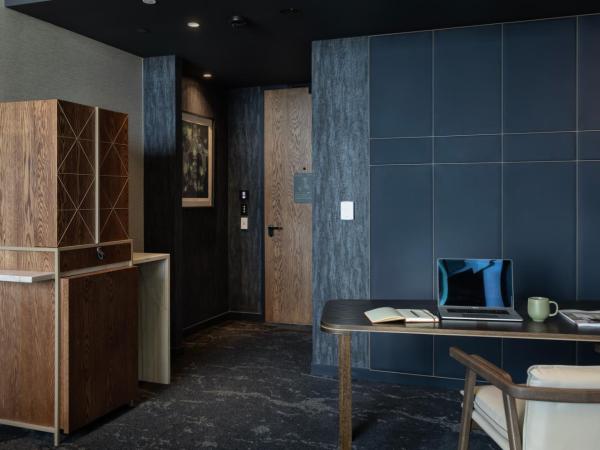 Pullman Auckland Airport : photo 9 de la chambre suite exécutive lit king-size 