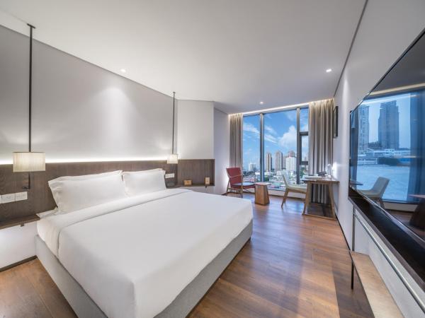 Wuyu Hotel - Chongqing Jiangbei Airport : photo 1 de la chambre chambre supérieure lit queen-size