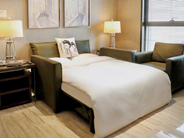 The Fairway Place, Xi'an - Marriott Executive Apartments : photo 3 de la chambre suite 1 chambre lit king-size en angle