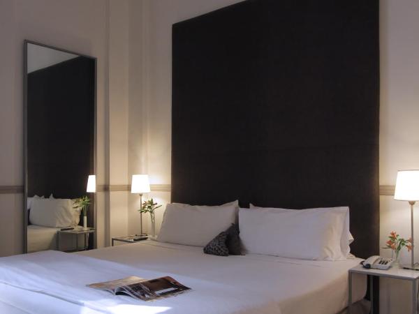 Esplendor by Wyndham Savoy Rosario : photo 10 de la chambre chambre lit king-size supérieure - non-fumeurs