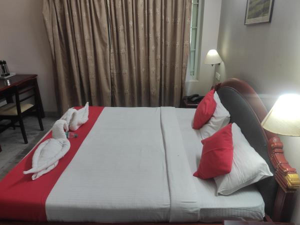 karthika residency : photo 3 de la chambre chambre double deluxe (2 adultes + 1 enfant)