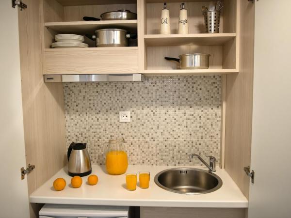 Iperion Beach Hotel : photo 4 de la chambre maisonnette