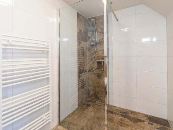 Plantage Garden Apartments : photo 7 de la chambre chambre quadruple en duplex