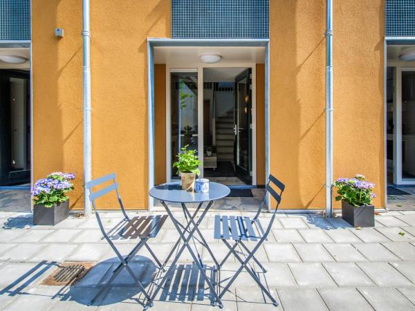 Plantage Garden Apartments : photo 1 de la chambre chambre quadruple en duplex