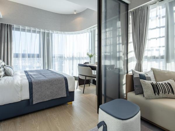 BORUISI Executive Apartment : photo 3 de la chambre chambre lit king-size supérieure