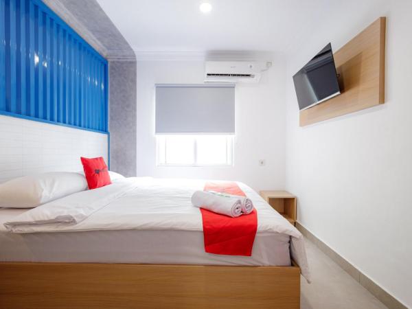 RedDoorz Plus at Jalan Gatot Subroto Jakarta : photo 9 de la chambre chambre deluxe