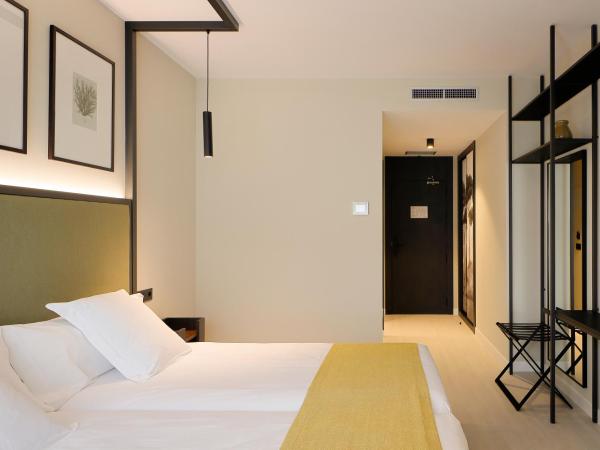 Nuvō Hotel Boutique : photo 3 de la chambre chambre lits jumeaux avec vue