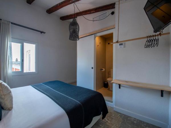 Hostal Boutique Es Menut : photo 10 de la chambre chambre double deluxe avec terrasse - vue sur mer
