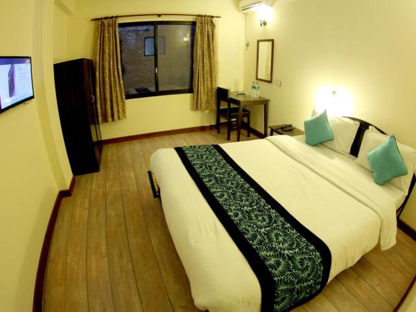 Bag Packer's Lodge : photo 2 de la chambre chambre deluxe double ou lits jumeaux