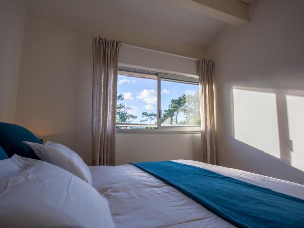 Le Lodge du Cap Ferret : photo 2 de la chambre appartement - vue sur jardin