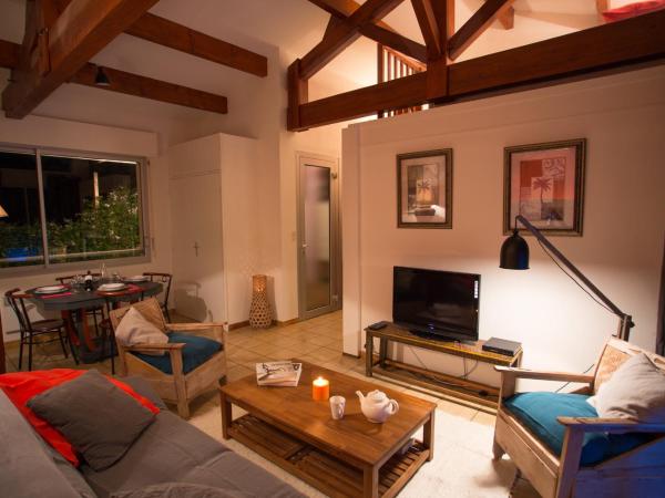 Le Lodge du Cap Ferret : photo 1 de la chambre appartement - vue sur jardin