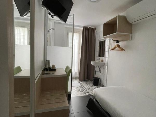 Hôtel De La Herse d'Or : photo 2 de la chambre chambre simple confort avec douche et toilettes 
