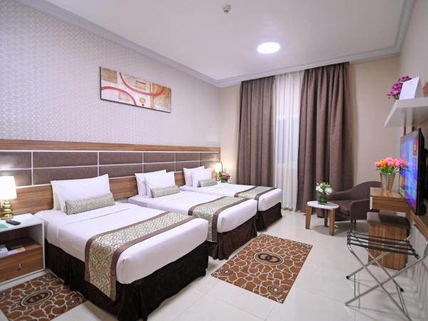 Emirates Stars Hotel Apartments Dubai : photo 1 de la chambre chambre triple de luxe