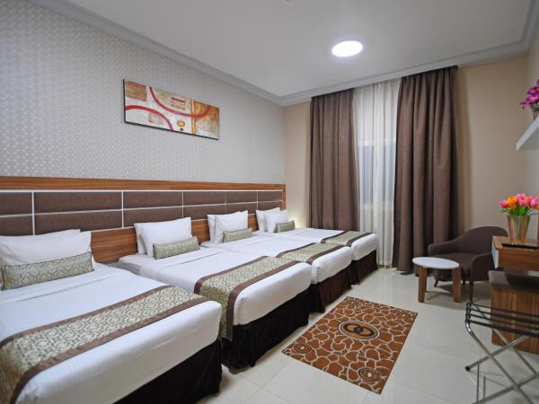 Emirates Stars Hotel Apartments Dubai : photo 1 de la chambre chambre quadruple de luxe