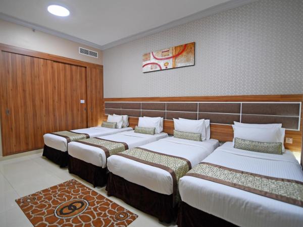 Emirates Stars Hotel Apartments Dubai : photo 2 de la chambre chambre quadruple de luxe