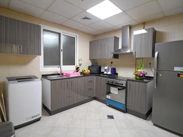 Emirates Stars Hotel Apartments Dubai : photo 4 de la chambre chambre quadruple de luxe