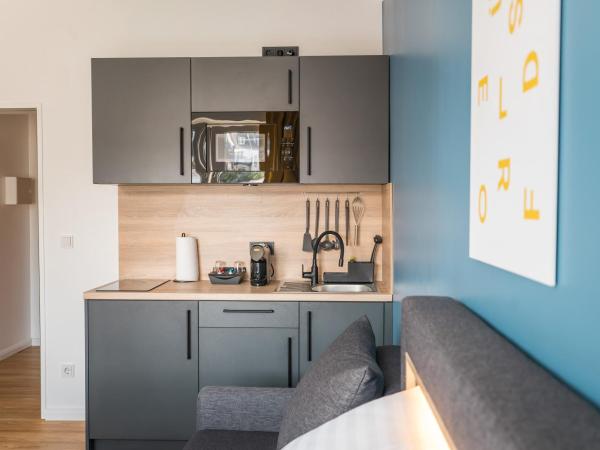 Antares Apartments : photo 3 de la chambre appartement supérieur