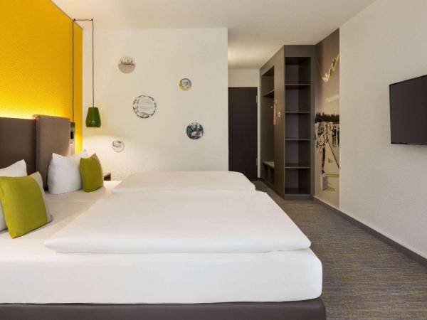 Vienna House Easy by Wyndham Leipzig : photo 2 de la chambre chambre confort plus