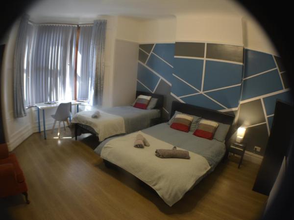 Kensington Guest House Liverpool : photo 1 de la chambre chambre triple