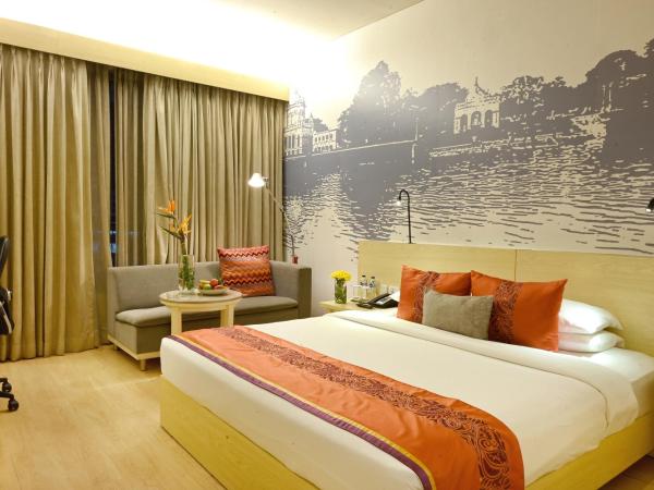 Vivanta Kolkata EM Bypass : photo 3 de la chambre chambre lit king-size deluxe - vue sur ville