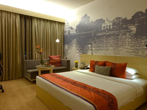 Vivanta Kolkata EM Bypass : photo 5 de la chambre chambre lit king-size deluxe - vue sur ville