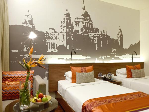 Vivanta Kolkata EM Bypass : photo 4 de la chambre chambre lits jumeaux deluxe - vue sur ville