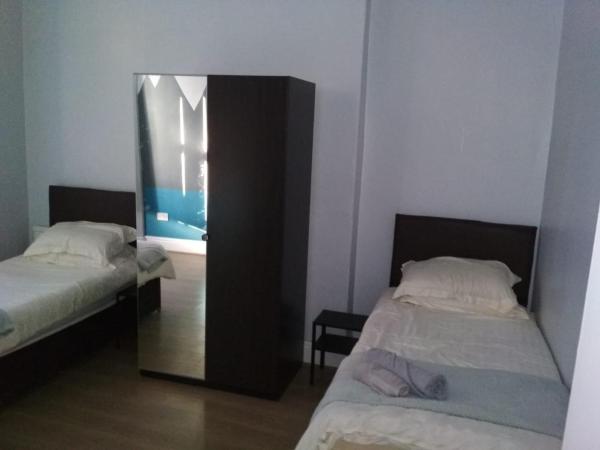 Kensington Guest House Liverpool : photo 1 de la chambre chambre lits jumeaux