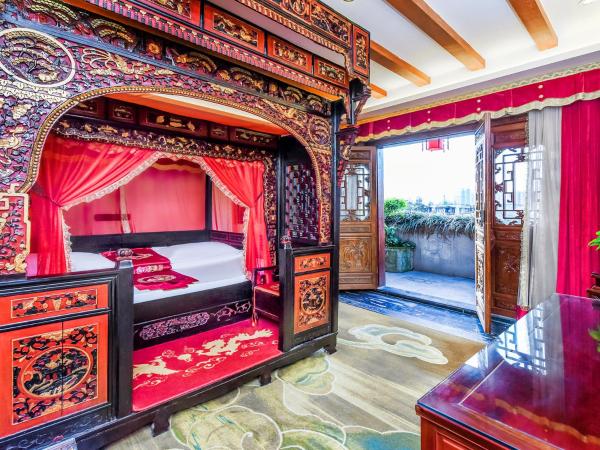 ChengDu Wuhou Temple Han Dynasty Hotel : photo 2 de la chambre chambre familiale traditionnelle chinoise