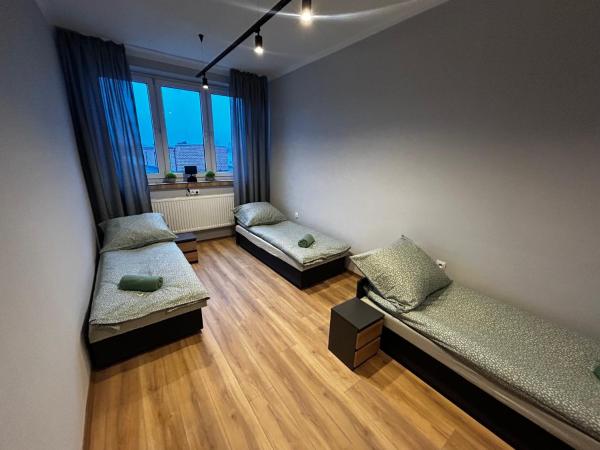 CZARNA PERŁA : photo 1 de la chambre chambre triple basique avec salle de bains commune