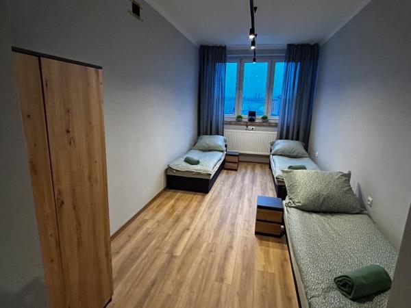 CZARNA PERŁA : photo 4 de la chambre chambre triple basique avec salle de bains commune