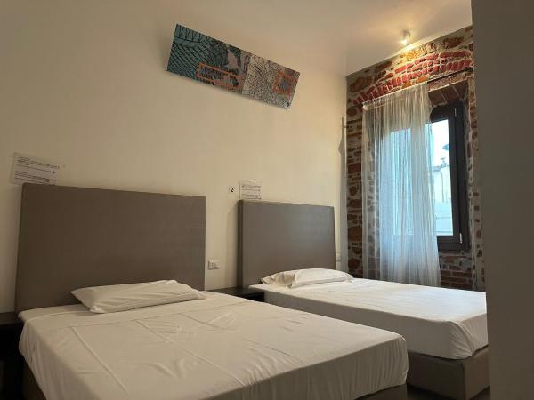 New Generation Hostel Milan Center Navigli : photo 3 de la chambre chambre quadruple