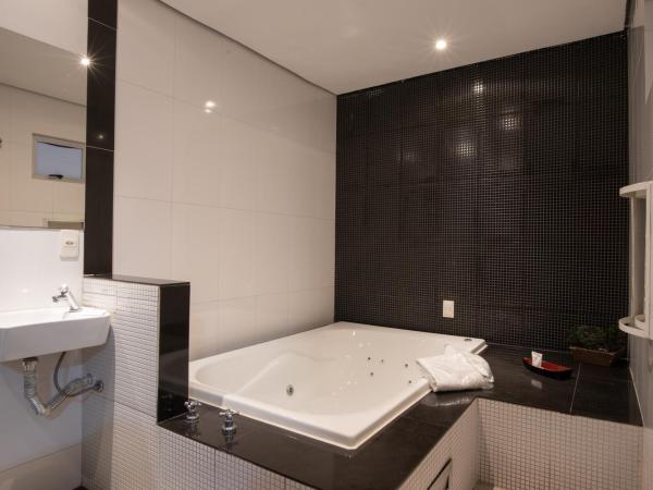 Motel Fantasy 1 : photo 7 de la chambre suite deluxe avec baignoire spa