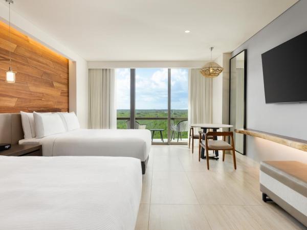 Hilton Cancun, an All-Inclusive Resort : photo 1 de la chambre chambre lit queen-size - vue sur coucher de soleil