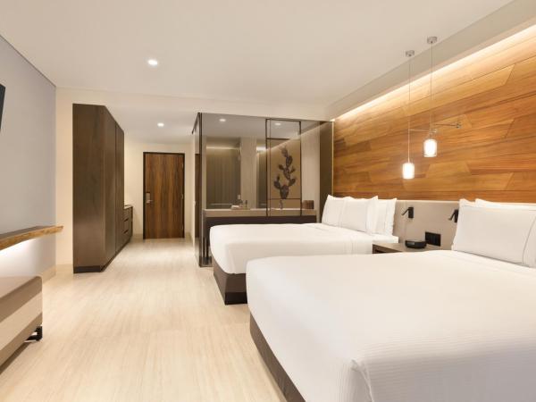 Hilton Cancun, an All-Inclusive Resort : photo 4 de la chambre chambre lit queen-size - vue sur coucher de soleil