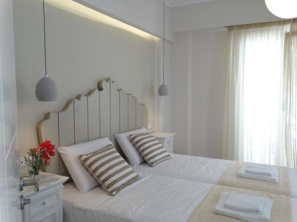 Anassa Suites : photo 1 de la chambre chambre double ou lits jumeaux avec balcon