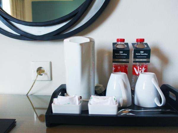 Hotel Santika Pandegiling - Surabaya : photo 5 de la chambre chambre lit king-size