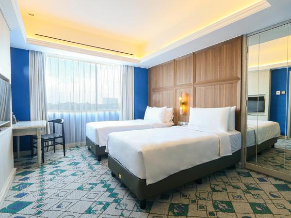 Java Paragon Hotel & Residences : photo 1 de la chambre deluxe twin premier
