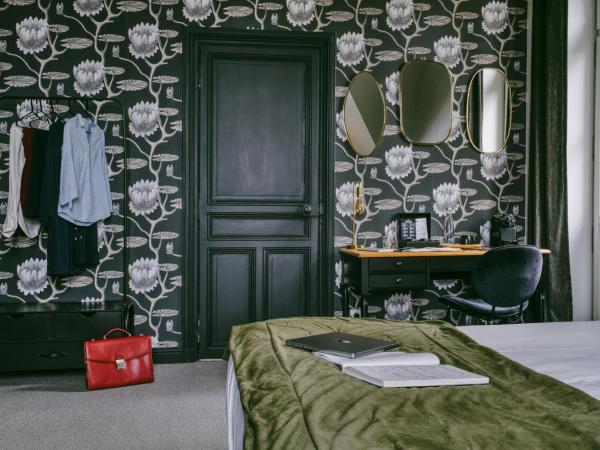 Le Château des Forges : photo 1 de la chambre chambre deluxe double ou lits jumeaux