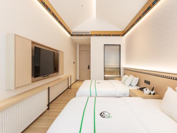 Xishu Garden Inn : photo 4 de la chambre chambre lits jumeaux confort