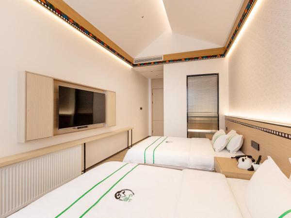 Xishu Garden Inn : photo 3 de la chambre chambre lits jumeaux confort