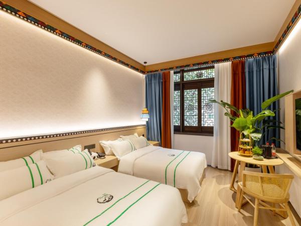 Xishu Garden Inn : photo 3 de la chambre chambre lits jumeaux standard
