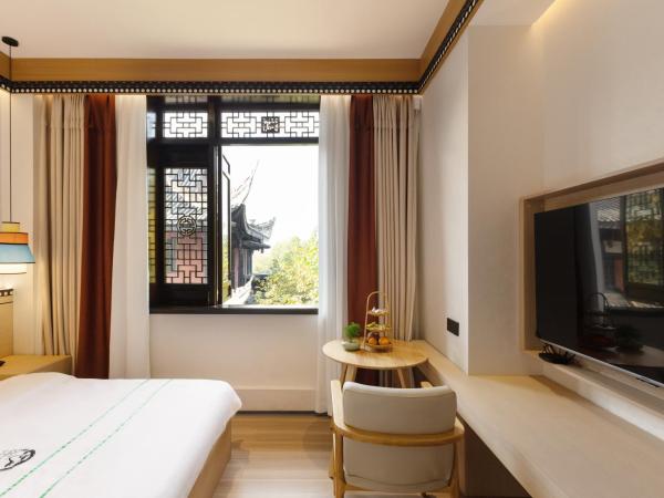 Xishu Garden Inn : photo 3 de la chambre chambre double standard